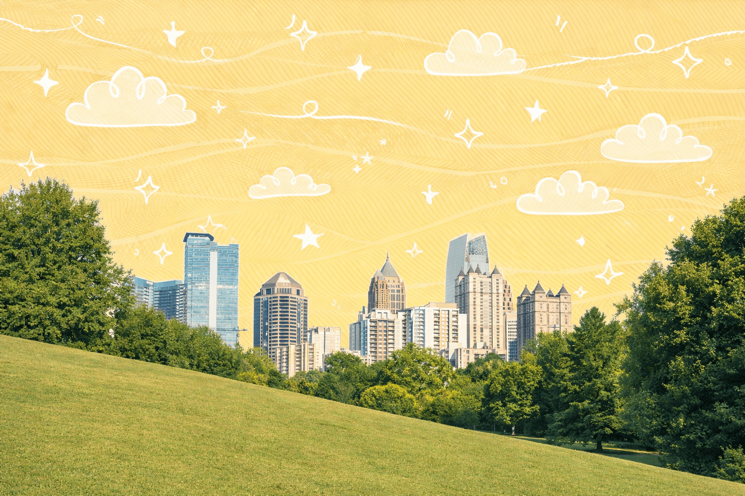 Atlanta, GA city skyline seen from a grassy park on a clear day.