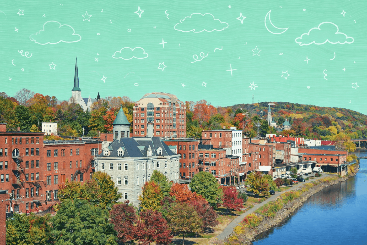 Scenic view of downtown Augusta, ME with historical buildings and vibrant fall foliage along the river.