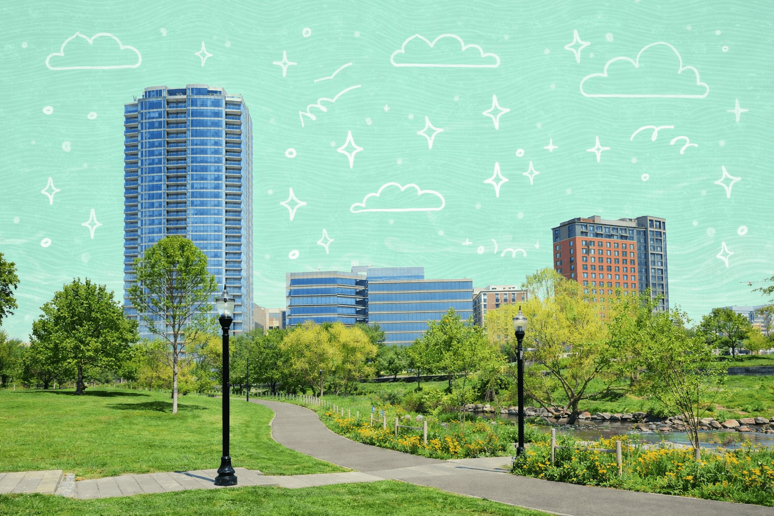 Scenic view of a park with trees and pathways leading to modern skyscrapers in Stamford, CT, under a clear blue sky.