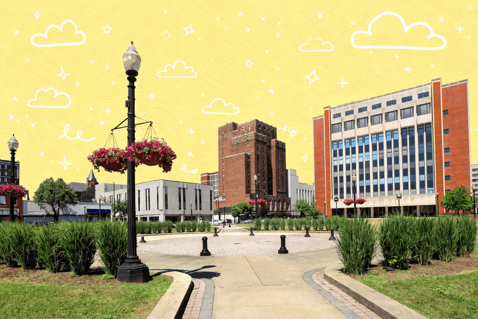 Downtown park and city buildings in Bridgeport Connecticut on a sunny day with landscaped walkways and flowers