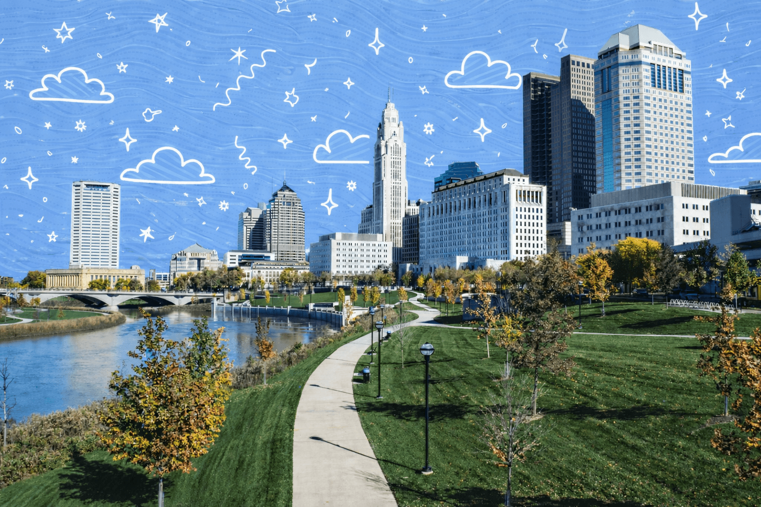 Downtown Columbus Ohio skyline along the Scioto Mile riverfront park on a sunny day with walking paths and green space