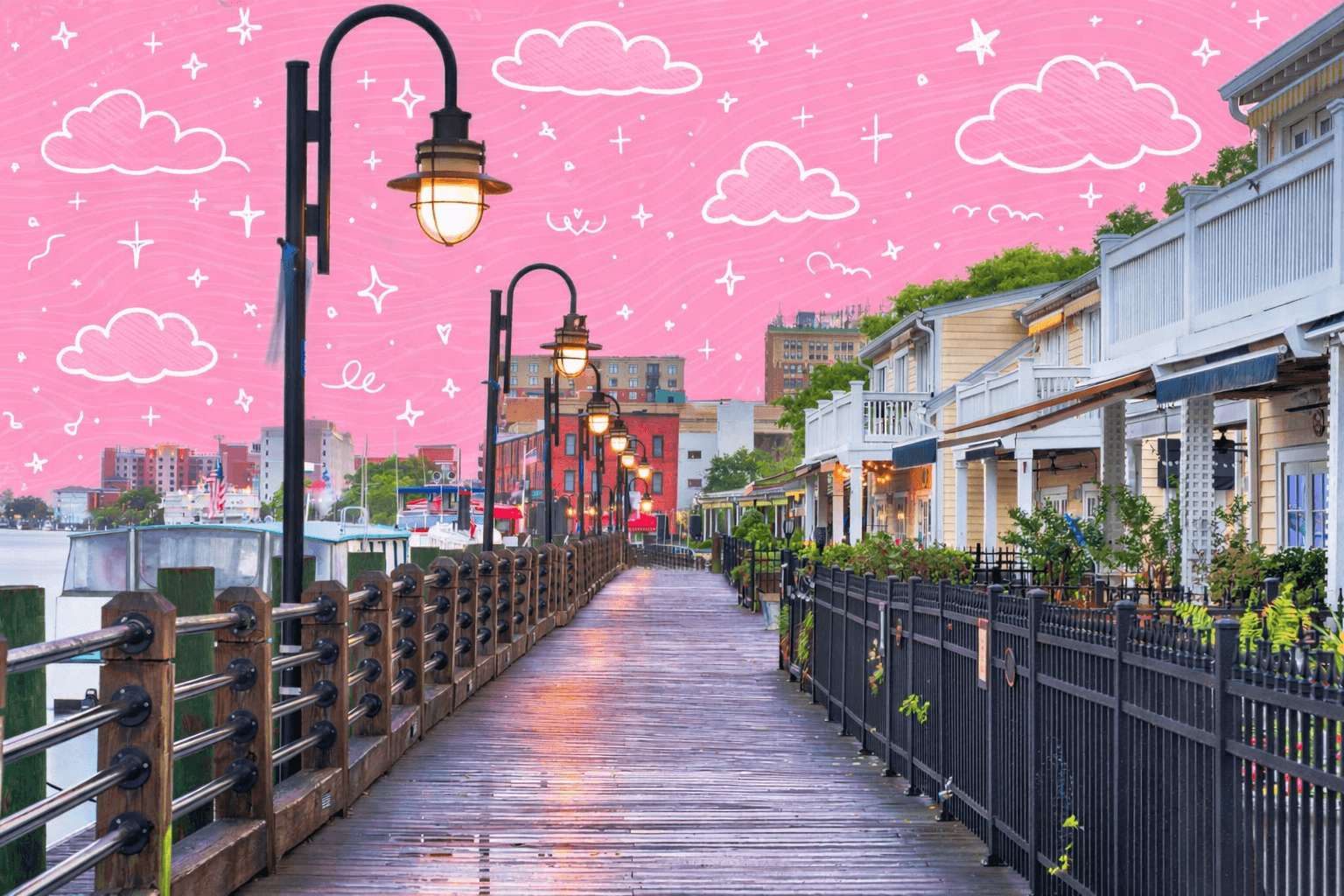 Norfolk, Virginia waterfront boardwalk with street lamps and historic homes.