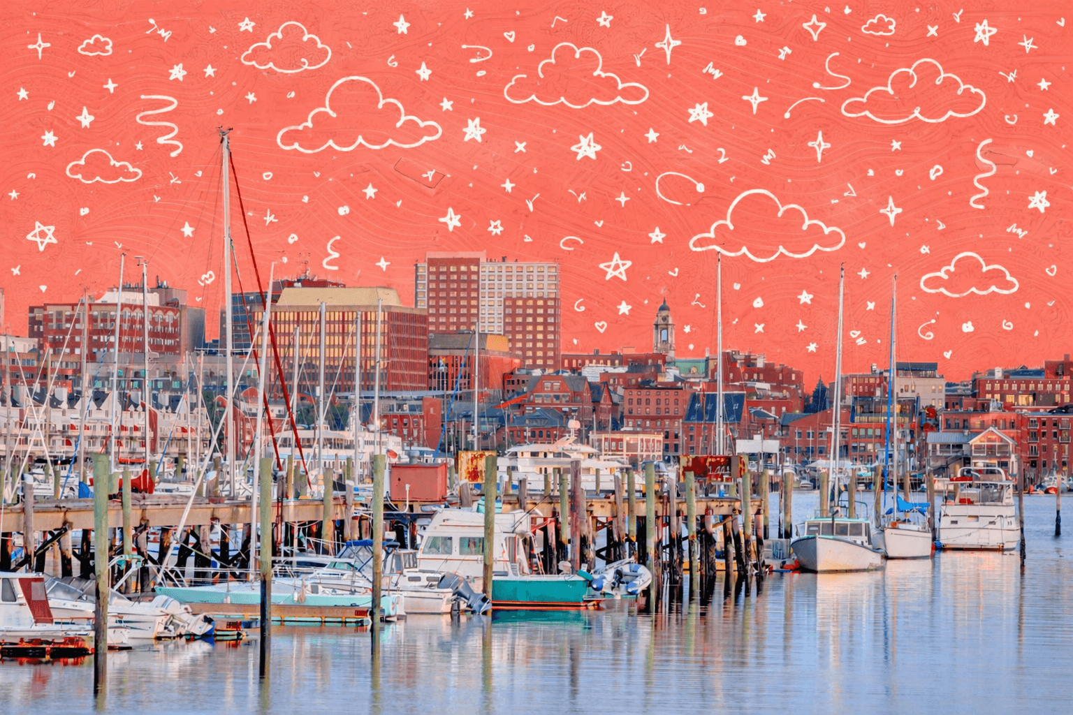 Waterfront marina with sailboats and fishing boats in Portland, Maine, showcasing the city skyline and coastal neighborhood lifestyle.