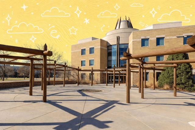 Outdoor space with a wooden pergola structure and modern building in Aurora, CO under a clear blue sky.