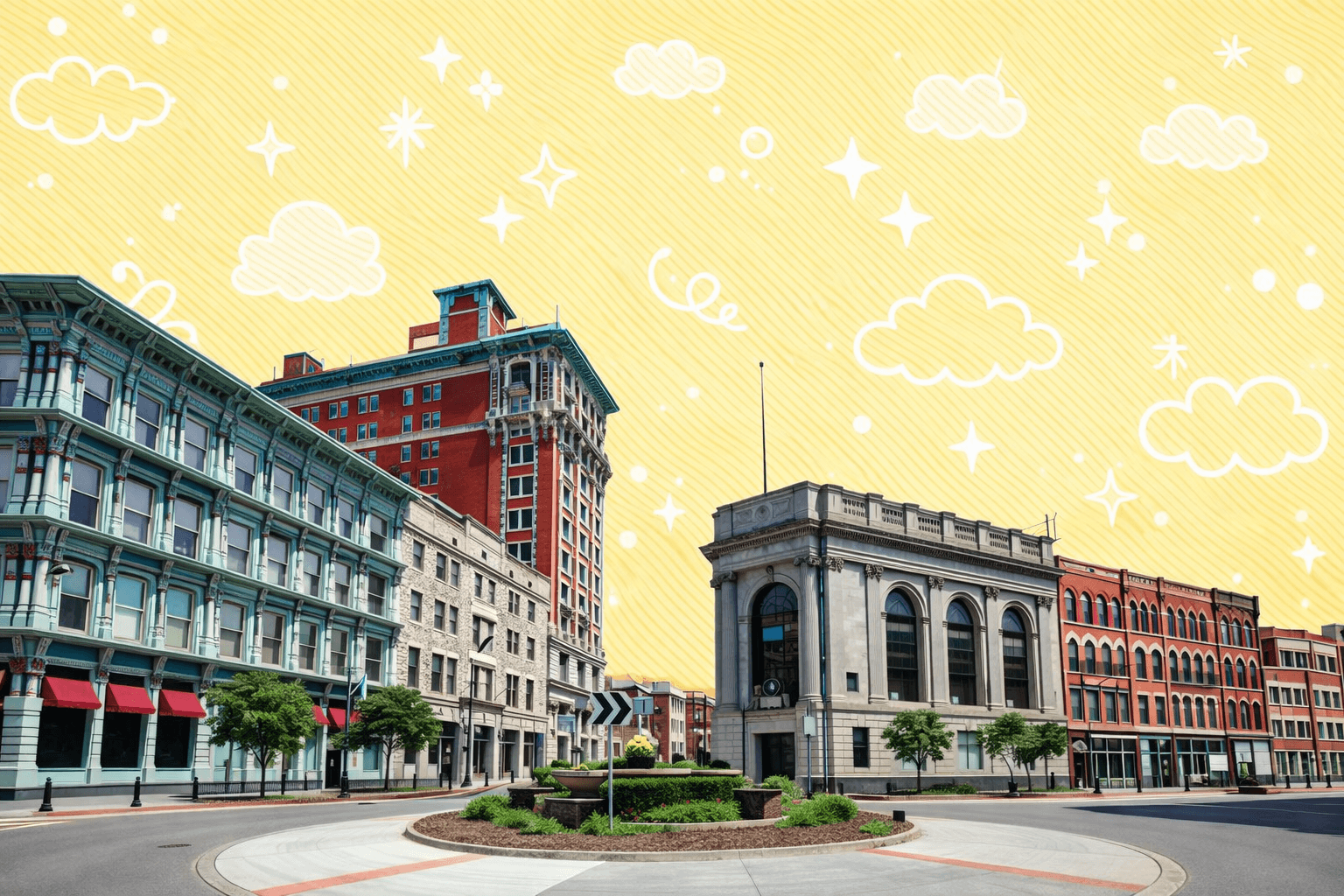 Historic buildings in downtown Binghamton, NY, showcasing architectural diversity under a clear blue sky.