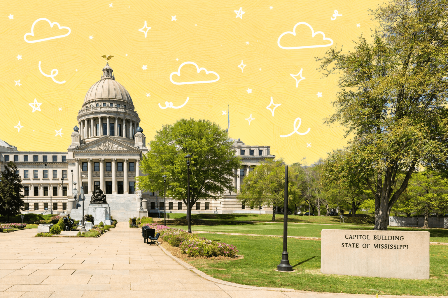 Exterior view of the Mississippi State Capitol building with a clear blue sky in Jackson, MS.