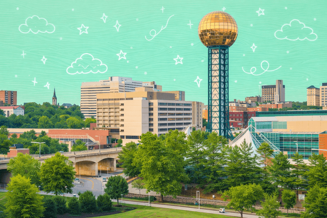 Skyline of Knoxville, TN featuring the iconic Sunsphere tower with surrounding buildings and greenery.