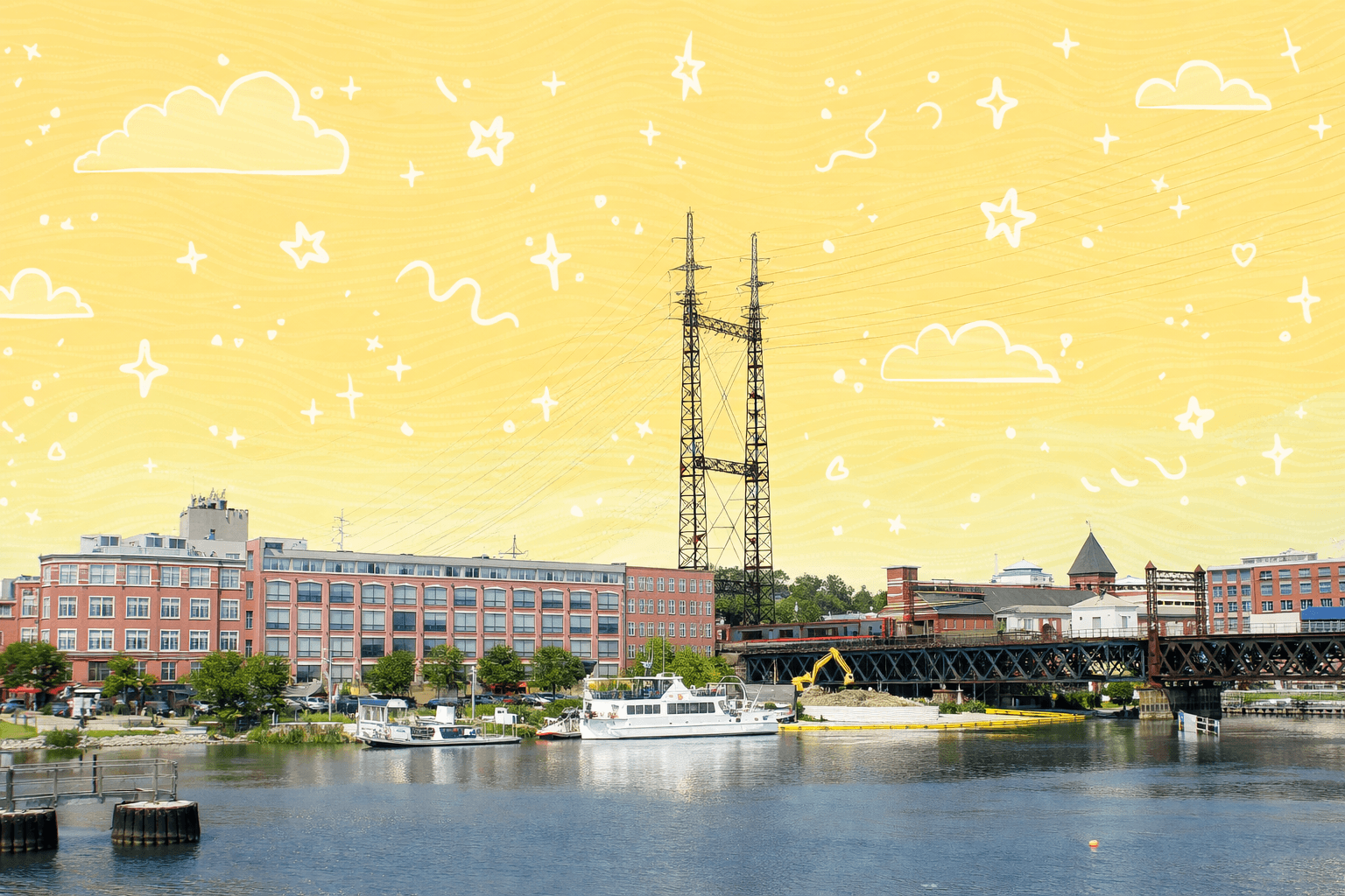 Waterfront scene in Norwalk, CT with buildings, boats, and a blue sky.