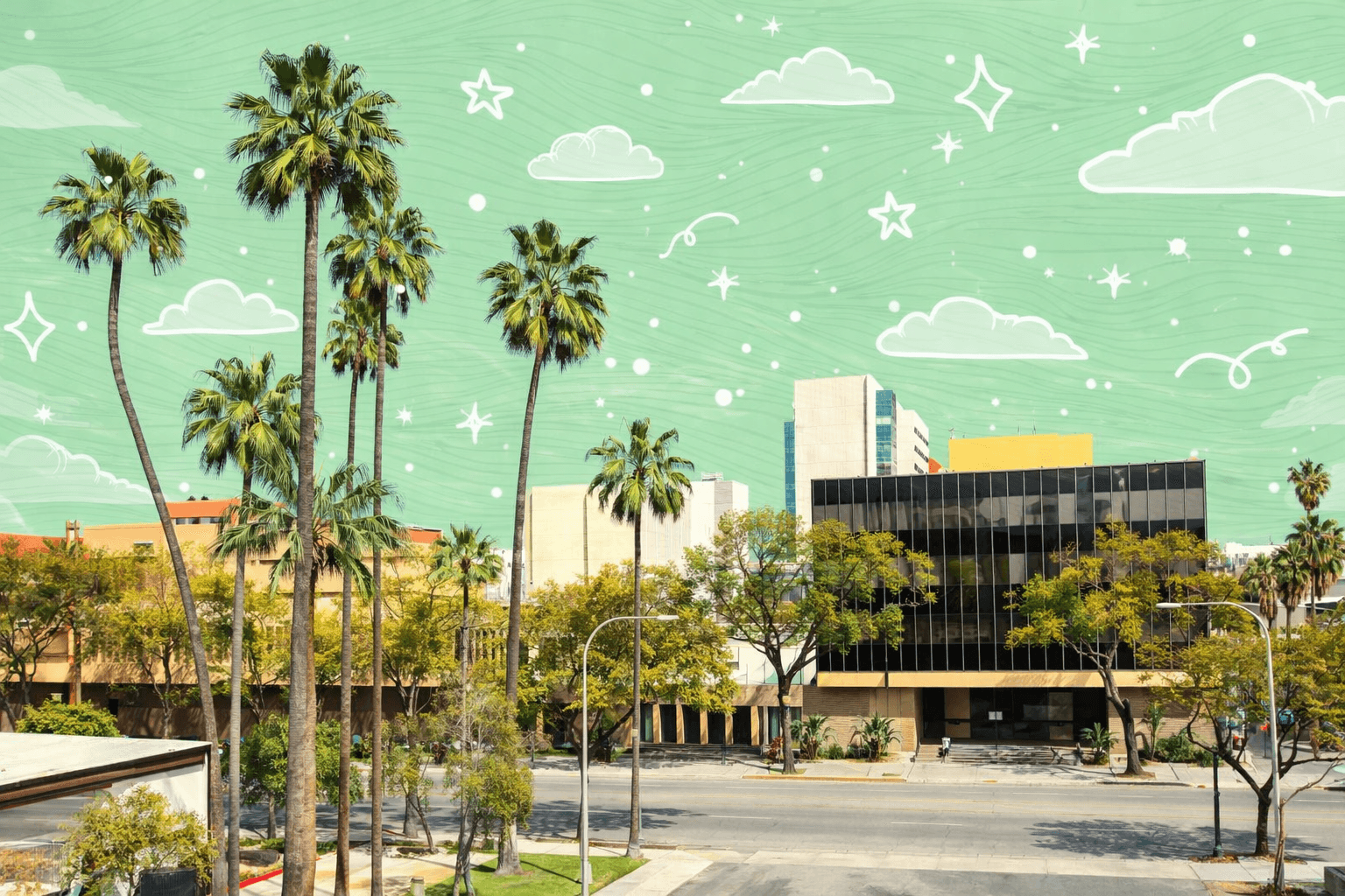 San Bernardino skyline with palm trees and office buildings under a blue sky.