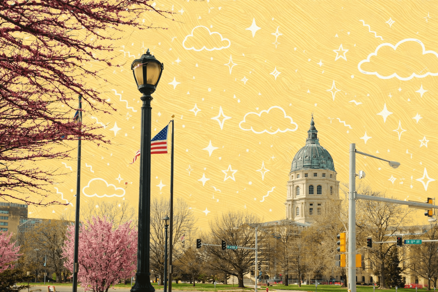 Kansas State Capitol building in Topeka Kansas with pink flowering trees and American flags on a sunny spring day.
