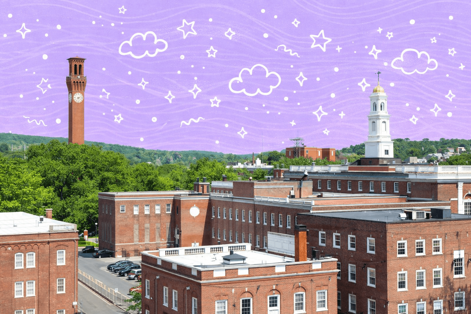 Scenic view of Waterbury, CT featuring brick buildings and a prominent clock tower against a green landscape.